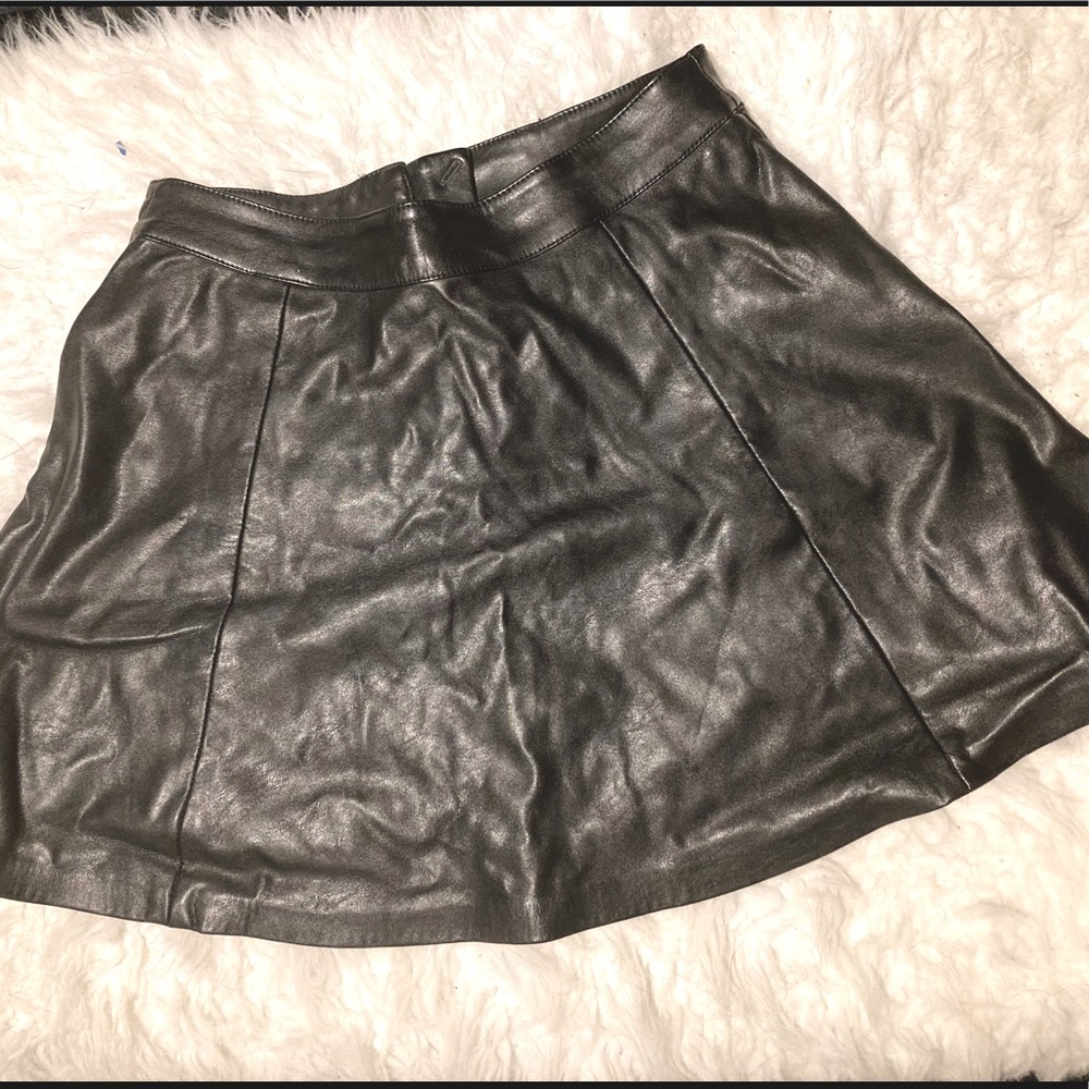 Black faux leather skater skirt.